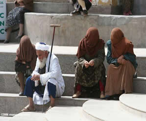 Uygur Man and Women at Mosque in Kashgar, China